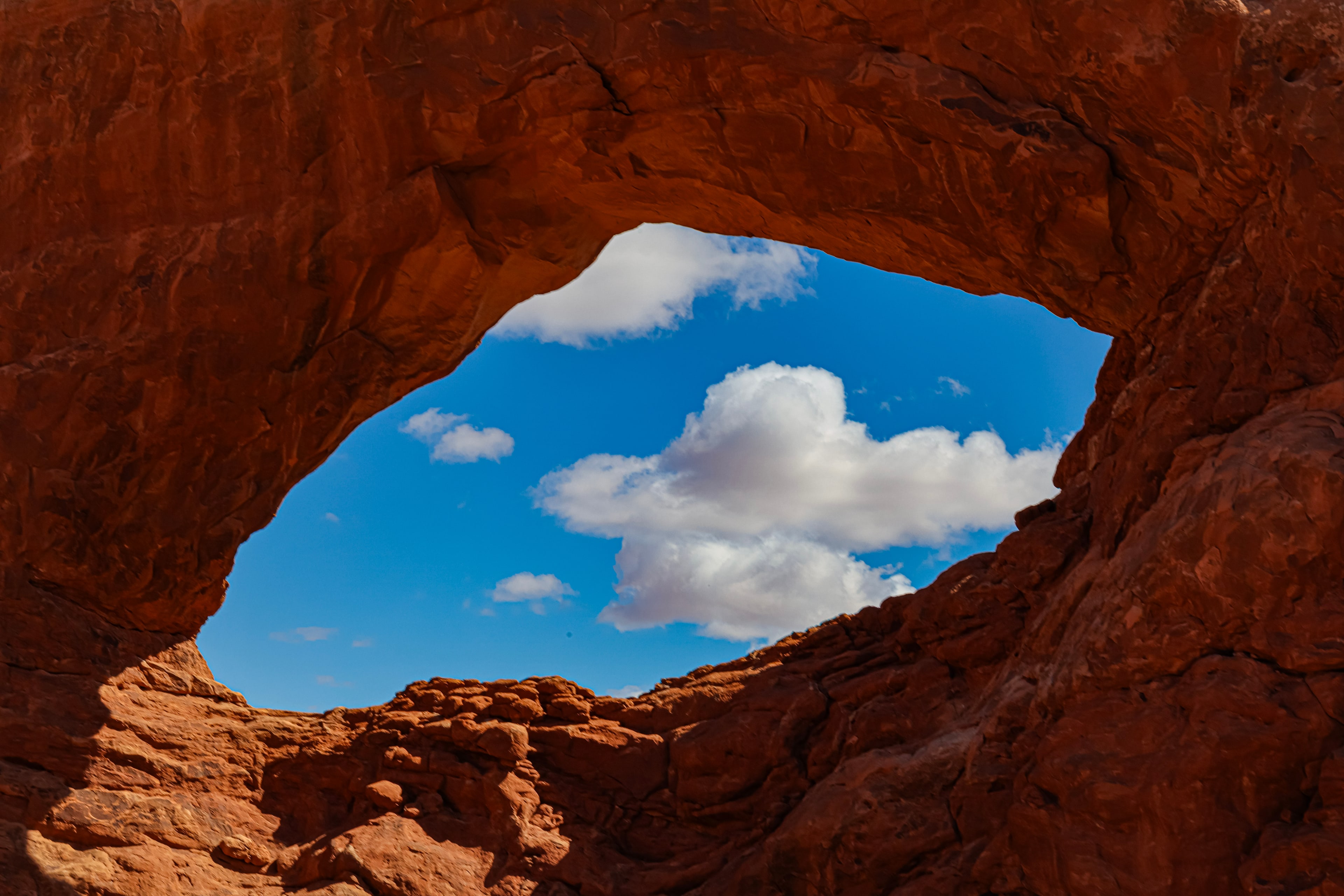 An arch opening onto cloud